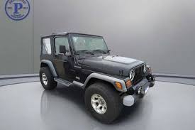 Image result for Brilliant Black 2002 Jeep