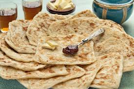 Msemen Are Flat Moroccan Pancakes Shaped By Laminating And Folding Dough Into A Square This Traditional Recipe Uses Some Recipes Moroccan Cooking Savoury Food