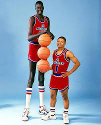 Manute bol and muggsy were shown on three magazine covers together. Manute Bol And Muggsy Bogues Of The 87 Washington Bullets Sports