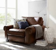 It's the turner from pottery barn. Turner Roll Arm Leather Armchair Pottery Barn