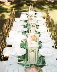 Christmas holiday table place setting with green napkin, red berries, silverware on cream white cloth place mat with copy space. Green Table Runner Photos Design Ideas Remodel And Decor Lonny