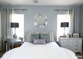 The golden color scheme, lavish headboard, ruffled and draped window treatments, ornate ceiling fixture, and curved, elaborate lines of the furniture all harken back to the style's origins in the 1930s. Modern Glam Bedroom Ideas Decor Atmosphere Dining Room Chic Contemporary Urban Curtains Behind Bed Bedroo Apppie Org