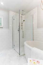 This stunning bath from designer mark williams is the stuff that dreams are made of. Corner Shower Next To Bathtub Transitional Bathroom Benjamin Moore Stonington Gray