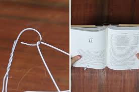 Spend Exactly Zero Dollars Building A Bookstand Out Of A Hanger Book Display Stand Diy Book Stands