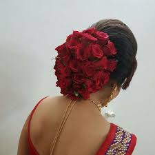 No matter what your hair type is, we can help you to find the right hairstyles. What A Beautiful Large Low Bun Covered With Real Flowers Care However Should Be Taken Before Adopting Such Bridal Hairdo Floral Hair Wedding Hairstyles Bride