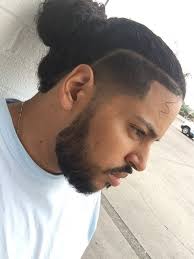 His jewelry from jason of beverly hills doesn't hurt either. The Man Bun With A Lineup Cool Hairstyles For Men Mens Hairstyles Fade Mens Hairstyles
