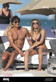 Italian actress Rita Rusic soaking up the sun on Miami Beach with her  boyfriend. Florida, California 