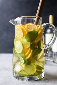 Easy Citrus White Wine Sangria With Loads Of Citrus White Wine And Citrus Vodka It S The Perfect Refr White Wine Sangria Sangria Recipes Easy Sangria Recipes