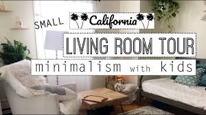 Stylish scandianvian decor of living room with design sofa with elegant blanket, coffee table, plants and bookstand. Small Minimalist Living Room Tour Minimalism With Kids Youtube