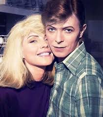 Happy 76th birthday to Blondie's Debbie Harry. Here's Debbie and David  Bowie backstage during Iggy Pop's 1977 "The Idiot" tour. 📷: Chris Stein