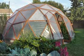 If you're looking for simple diy greenhouse plans or ideas to build one in your garden, read this! 13 Cheap Diy Greenhouse Plans Off Grid World