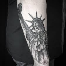 She is probably only second to the actual american flag, in terms of being the symbol of the american spirit. 10 Statue Of Liberty Tattoo Designs