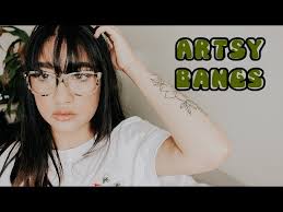 CUTTING MY HAIR!! (BANGS)