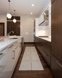The galley layout works well for all kitchen styles; Kitchen Design 101 What Is A Galley Kitchen Layout Dura Supreme Cabinetry