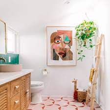 We love the idea of hanging a portrait in the bathroom—it adds a little unexpected sophistication to the space. 15 Bathrooms With Beautiful Wall Decor That Will Inspire A Refresh