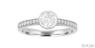 Yellow diamond halo ring, £2,580, fraser hart shop now Engagement Ring Settings To Make Your Diamond Look Bigger