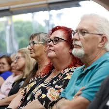 We're talking to our neighbors about the MAGA rampage — and people are  listening