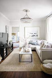 6 Ways To Make Your Small Living Room Feel Bigger The Everygirl Living Room Decor Apartment Small Living Room Decor Small Living Rooms