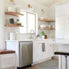The open shelving in this kitchen is done in a superbly sleek and contemporary way which gives an enhanced aesthetic appearance of this bold kitchen. Wraparound Floating Kitchen Shelves Design Ideas