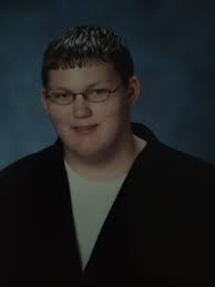 I this is my son who was murdered. He was just 9yr old. Could someone  please do age presecion so I can see what he would look like today. He  would be