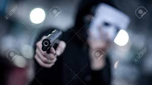 Mystery Hoodie Man In White Mask Pointing Gun Crime And Violence Stock Photo Picture And Royalty Free Image Image 112123916