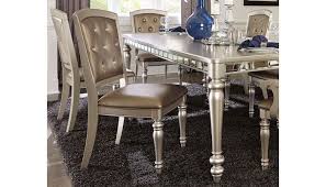 The mirrored finish add a subtle layer of elegance and glamour to these highly functional design. Arsenia Mirrored Dining Room Furniture Set