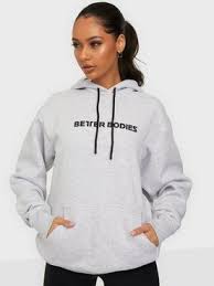 It features a front kangaroo pocket and a large better bodies logo. Logo Hoodie Light Grey Melange Better Bodies Nelly Com