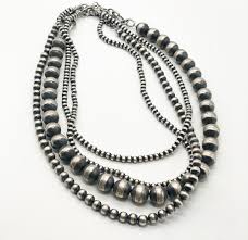 Navajo necklace may be plain chains, chokers, beaded, or made of pearls. 4mm Navajo Pearl Choker Necklace Buckskin Lace