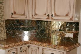 All of our antiqued mirror and verre eglomise finishes can be ordered for use as toughened antique mirror splashbacks behind a heat source such as an aga or gas hob. Antique Mirror Backsplash