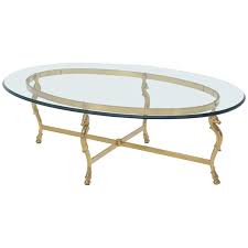 My favorite beautiful and stylish oval shape glass top coffee tables! Oval Solid Brass Hoof Feet Horse Heads Base Glass Top Coffee Table For Sale At 1stdibs
