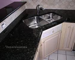 It is not recoganizable from a distant, but on a black granite countertop with white cabinets. Black Galaxy White Star Granite Rk Marbles India Best Price