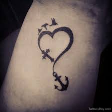 Each has special meaning and significance and is truly beautiful. Anchor Cross Heart Tattoo With Flying Birds On Wrist Entertainmentmesh