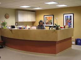 Wow textured front desk, exposed ceiling, track lighting, original exposed brick wall, neutral flooring, simple retail area, simple waiting chairs, natural light and privacy with frosted windows. Front Desk Quotes Quotesgram