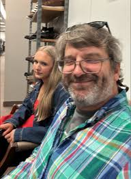 Banks and I shop alike. We make a couple of quick laps, realize we don't  want anything… and then find a chair. Her face says it all. “This is how I  spend