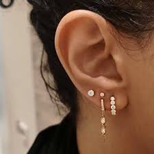 Invisible Or Scalloped Set Diamonds Why Not Both Slide Into Our Dms For At Home Consultations On How To Style Your In 2020 Ear Jewelry Diamond Ear Piercings