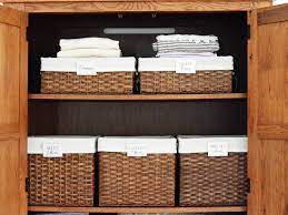Label the baskets and bins. Organizing A Linen Closet Hgtv