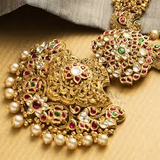 For inquiries, contact details are given below. Ethnic Gold Necklace From Nac Jewellers South India Jewels