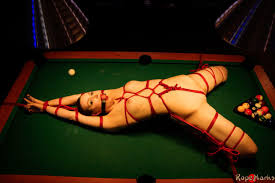 Beautiful girl Dutch Dame is tied up in the nude on top of a pool table -  Pichunter