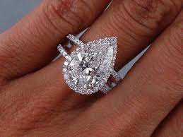 Pear With Halo And Double Band Pear Shaped Diamond Engagement Rings Pave Diamond Engagement Rings Wedding Rings Engagement
