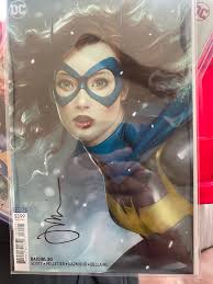 Collecting and signing comic books, specifically supergirl and superman