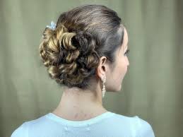 You'll have the prettiest hair in the office in four easy steps thanks to this fab tutorial at makeup.com. Simple Braided Messy Bun Video Tutorial Diy Crafts