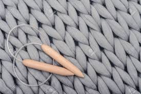 Amzn.to/2guq2z5 (affiliate link) for this arm knitting blanket project you will need super bulky knit a scarf in 30 minutes without needles and just one skein of yarn! Knitting Needles On Gray Knitted Blanket From Merino Wool Super Stock Photo Picture And Royalty Free Image Image 99709892