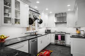 If you are looking for a natural stone which adds warmth to your kitchen with white cabinets, black soapstone countertop is the best choice. 10 Most Adorable White Kitchen Cabinets With Black Countertops To Create Elegant Modern Style Aprylann
