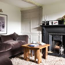 Cottages are traditionally quaint and reminiscent of the english thatched cottage. Small Living Room Ideas How To Dress Compact Sitting Rooms And Snugs