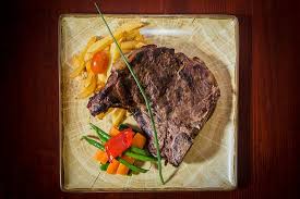Dump a chimney of lit coals into the grill. Grilled T Bone Steak Picture Of Bodega Jose Carvery International Food Charcoal Grill Lanzarote Tripadvisor