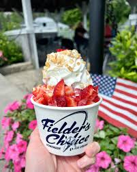 What says summer in New England better than strawberries? …strawberries on  ice cream! Come celebrate National Strawberry Sundae Day today at Fielder's  Choice! Try ordering a Strawberry Sundae with our strawberry soft