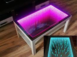 Using just a small amount of wood, a 3 or 4 strip led light kit , and a sheet of frosted plexiglass, you can have a professional looking light table for around $50 dollars. White Table Led 3d Coffee Table Illuminated Infinity Mirror Effect Remote Rf 239 00 Infinity Mirror Infinity Table Weird Furniture