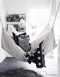 14 diy hammocks and hanging chairs to make summer naps awesome 1.$40 diy hammock stand 2. Simple And Cozy Indoor Hammock Bed Indoor Hammock Bed Indoor Hammock Outdoor Hanging Bed