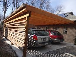 If you would like to have a carport that is attached to your permanent structure, then you'll be interested in this. Mid Century Modern Carport Greyslate Provided Construction Services Midcentury Garage Indianapolis By Greyslate Building Group Llc Houzz