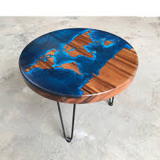 A map coffee table is a type of low table that is often placed in front of a couch in a living room or family room, featuring a map on the surface of the table rather than a plain wood or glass surface. High Quality Modern Round Table Coffee Table World Map Wood River Table Buy Resin Wood Table Resin Table Solid Wood And Resin Table Product On Alibaba Com